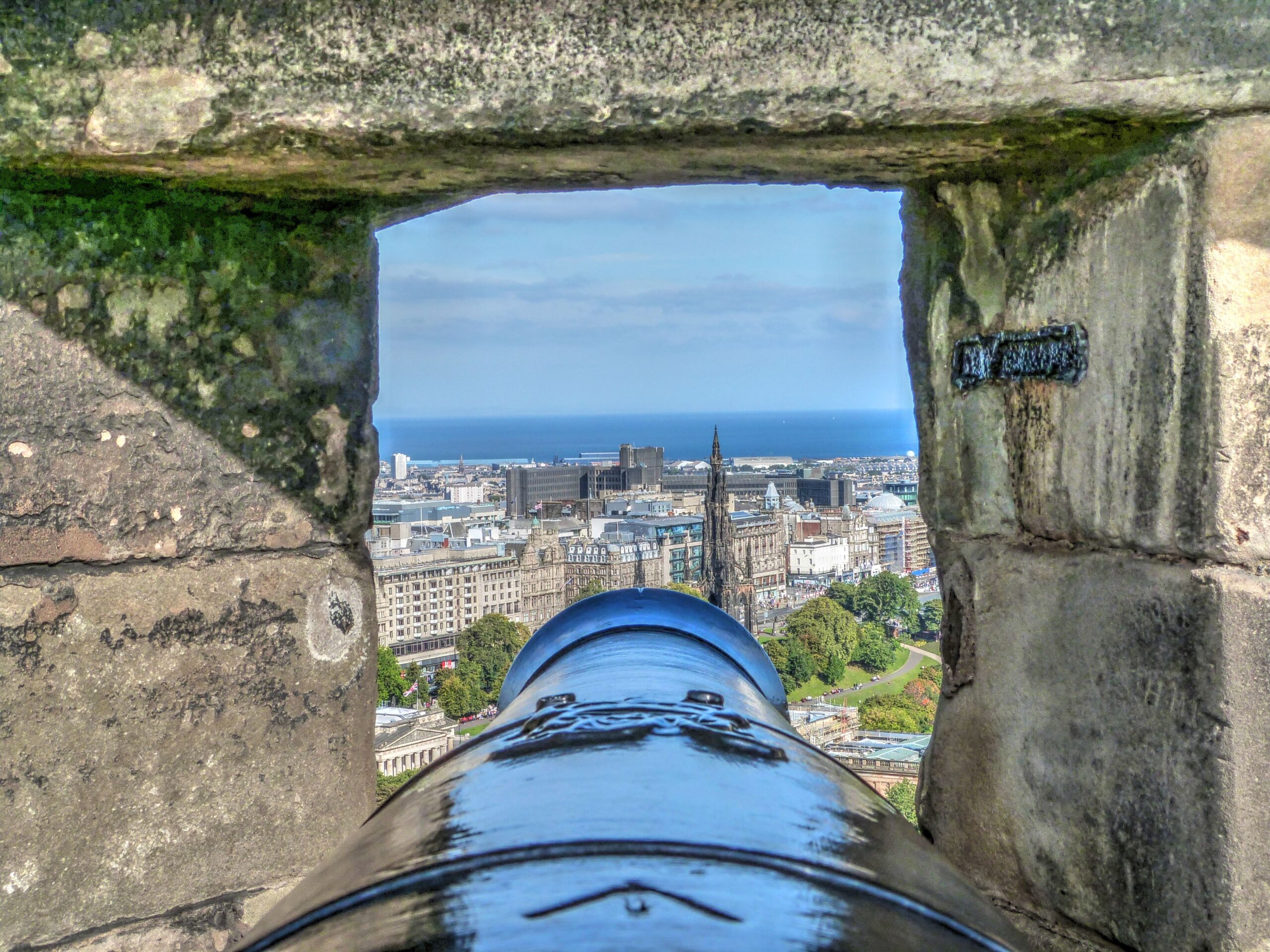Edinburgh seen through gun port of castle