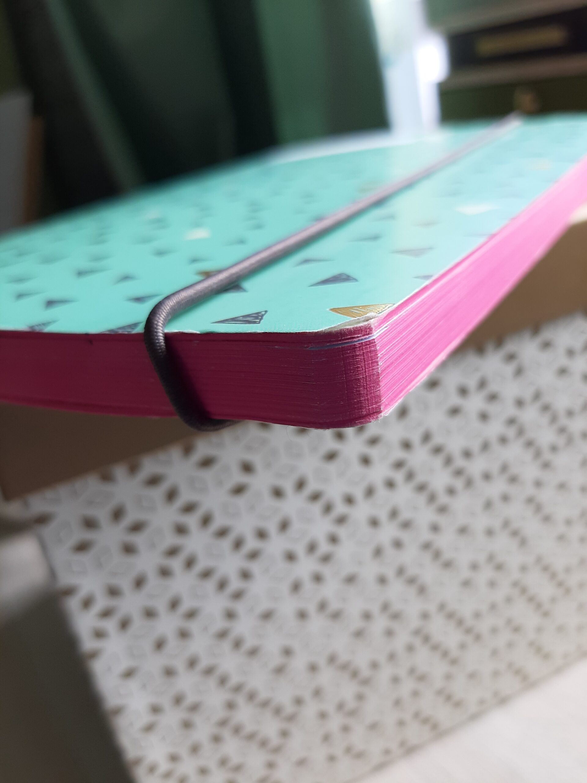 Notebook with pink page edges