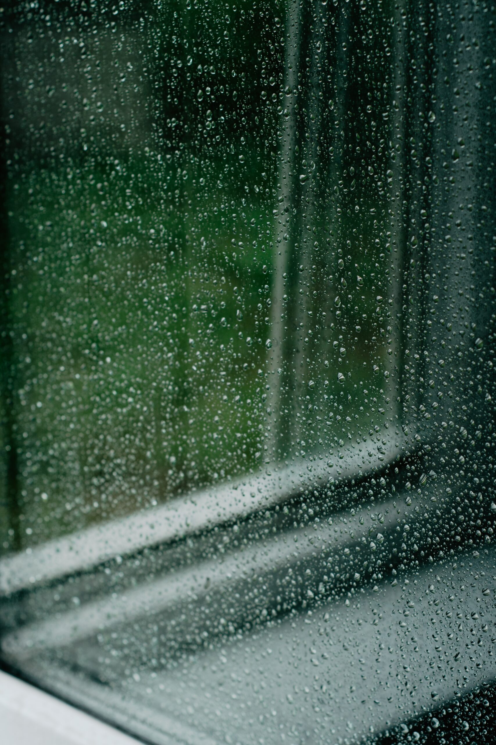 rain through window, gloomy, green